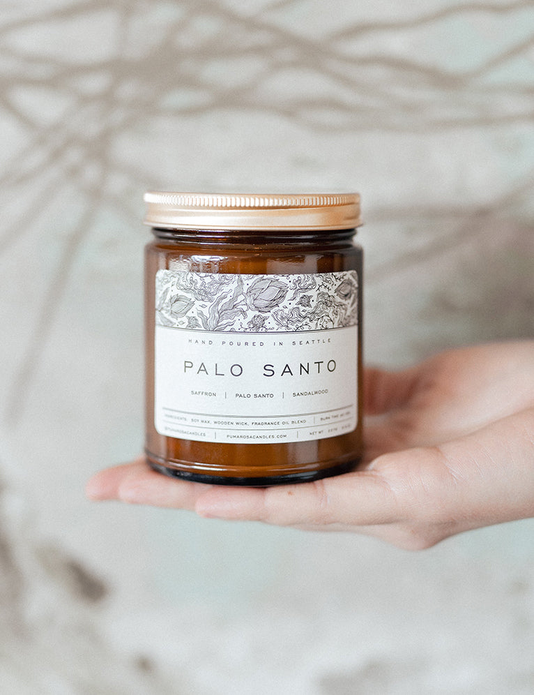 Palo Santo-scented soy candle by Pumarosa, featuring a calming and spiritual aroma for meditation and relaxation.