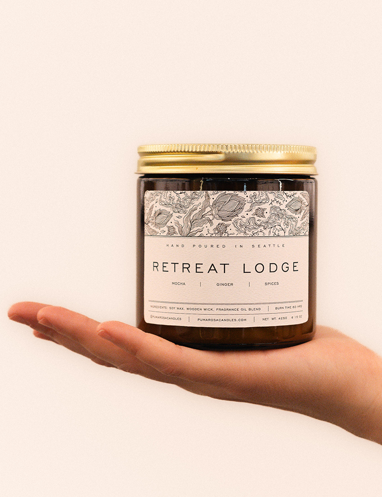 Retreat Lodge-scented natural soy candle by Pumarosa, inspired by the warmth and tranquility of a cozy lodge retreat.